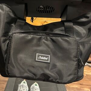 NWOT Foldie Men's Sleek Black Duffel Bag